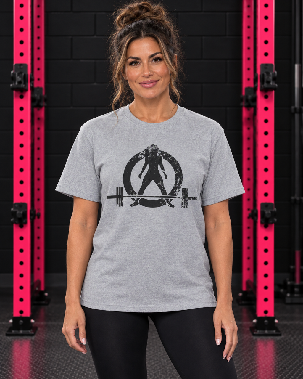 Woman wearing sport grey WWLW unisex distressed black logo tee in black and pink gym