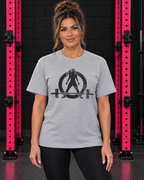 Woman wearing sport grey WWLW unisex distressed black logo tee in black and pink gym