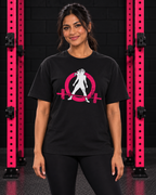 Woman wearing black WWLW unisex distressed color logo tee in black and pink gym