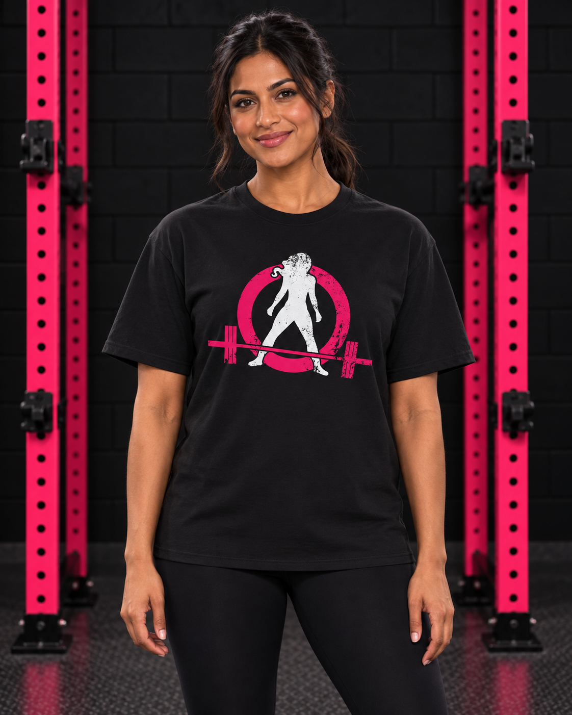Woman wearing black WWLW unisex distressed color logo tee in black and pink gym