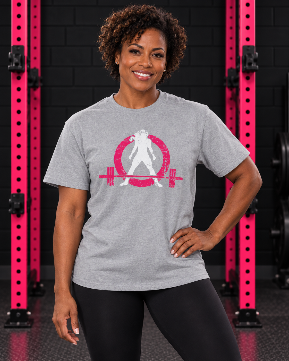 Woman wearing sport grey WWLW unisex distressed color logo tee in black and pink gym