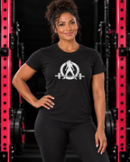 Woman wearing Black WWLW white distressed logo Softstyle tee in pink-rack gym